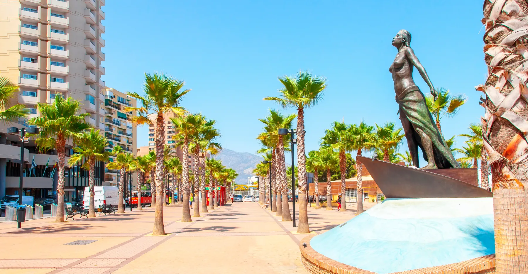 Palm-lined promenade and public art in Fuengirola