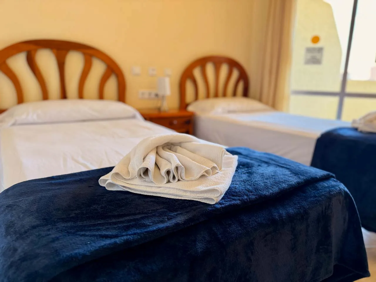 Kingfisher family holiday apartment with flexible sleeping space and a private terrace at Benal Beach