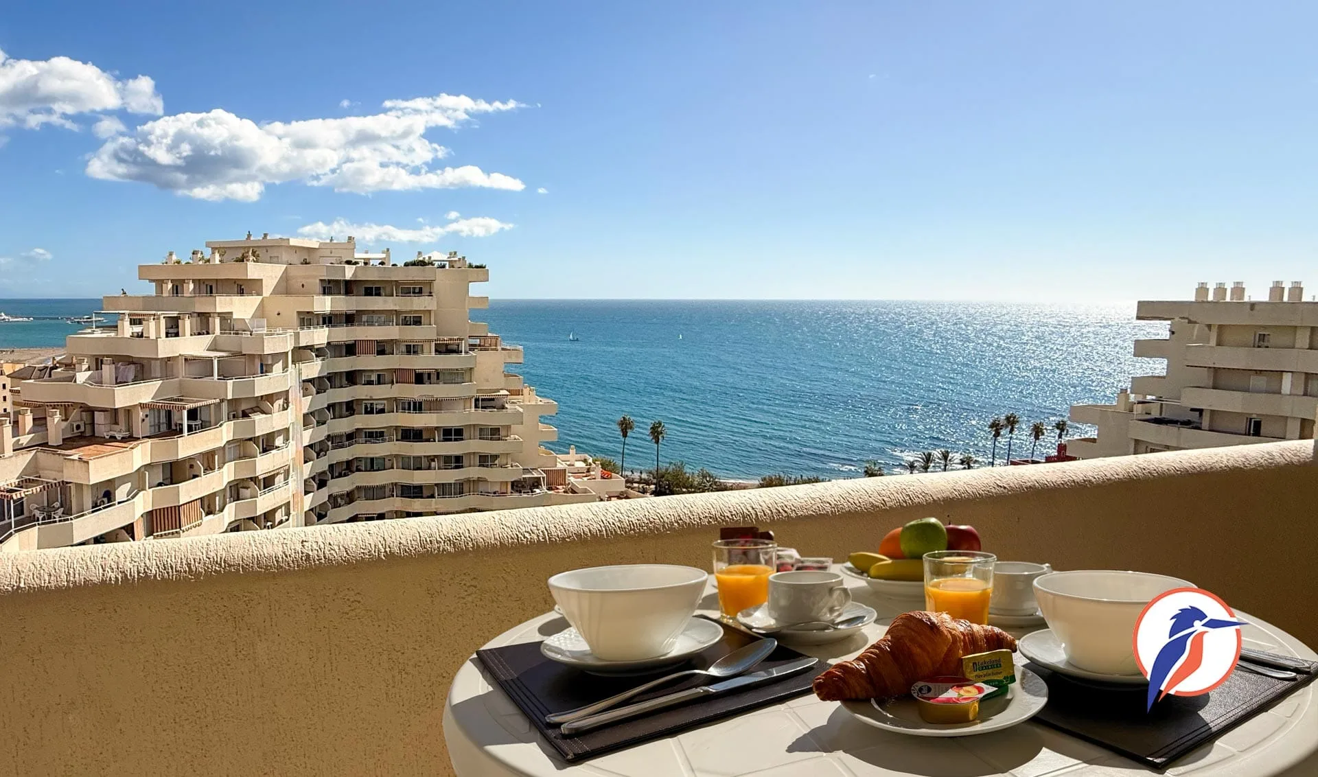 Breakfast on a sunny terrace overlooking the Mediterranean
