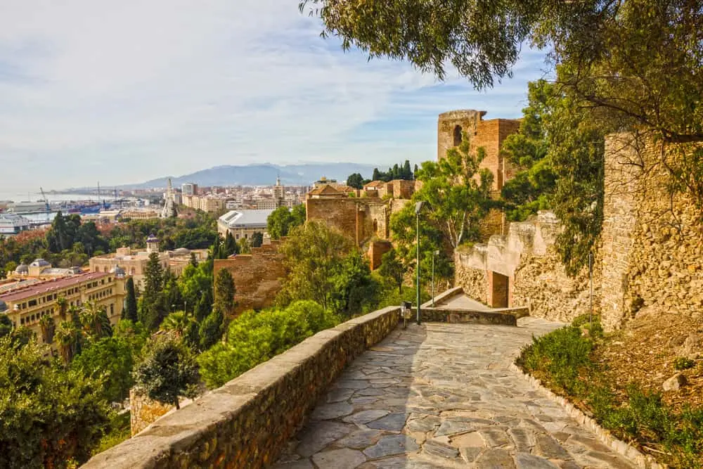 Stone path beside the Alcazaba overlooking Málaga city, port and Mediterranean coast