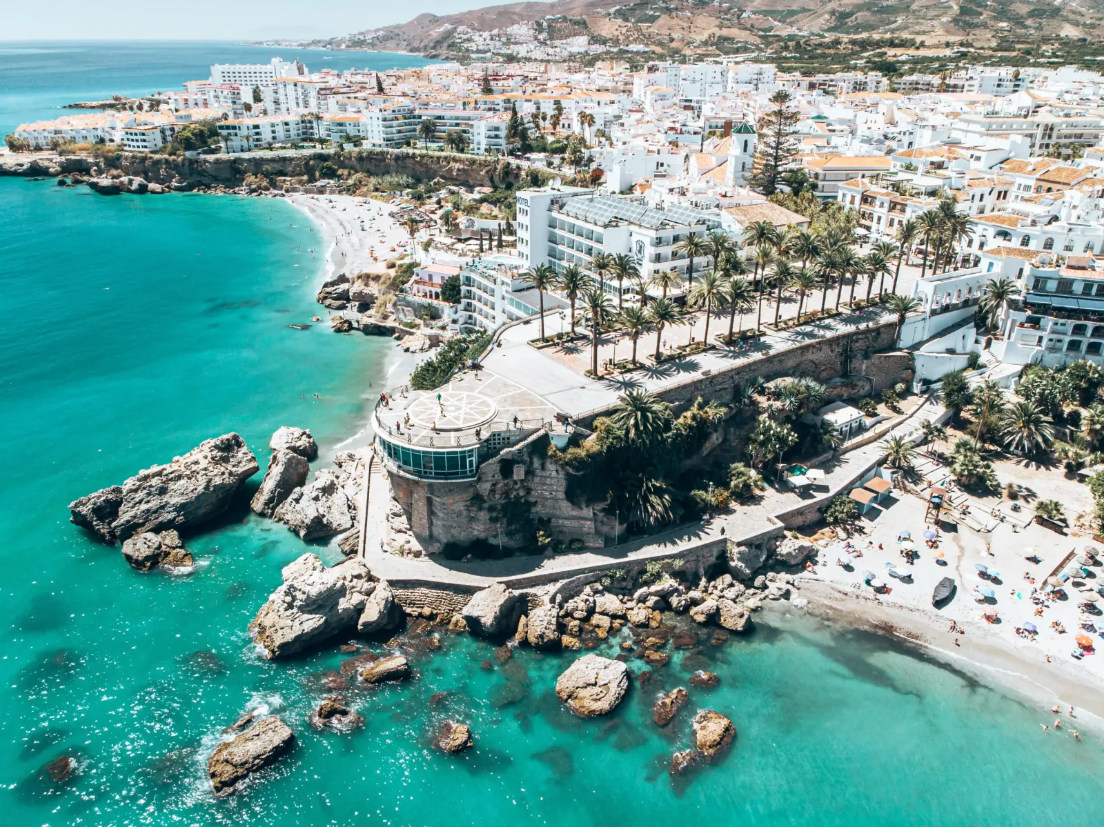 Aerial view of Nerja’s turquoise coves, beaches and Balcón de Europa on the Costa del Sol