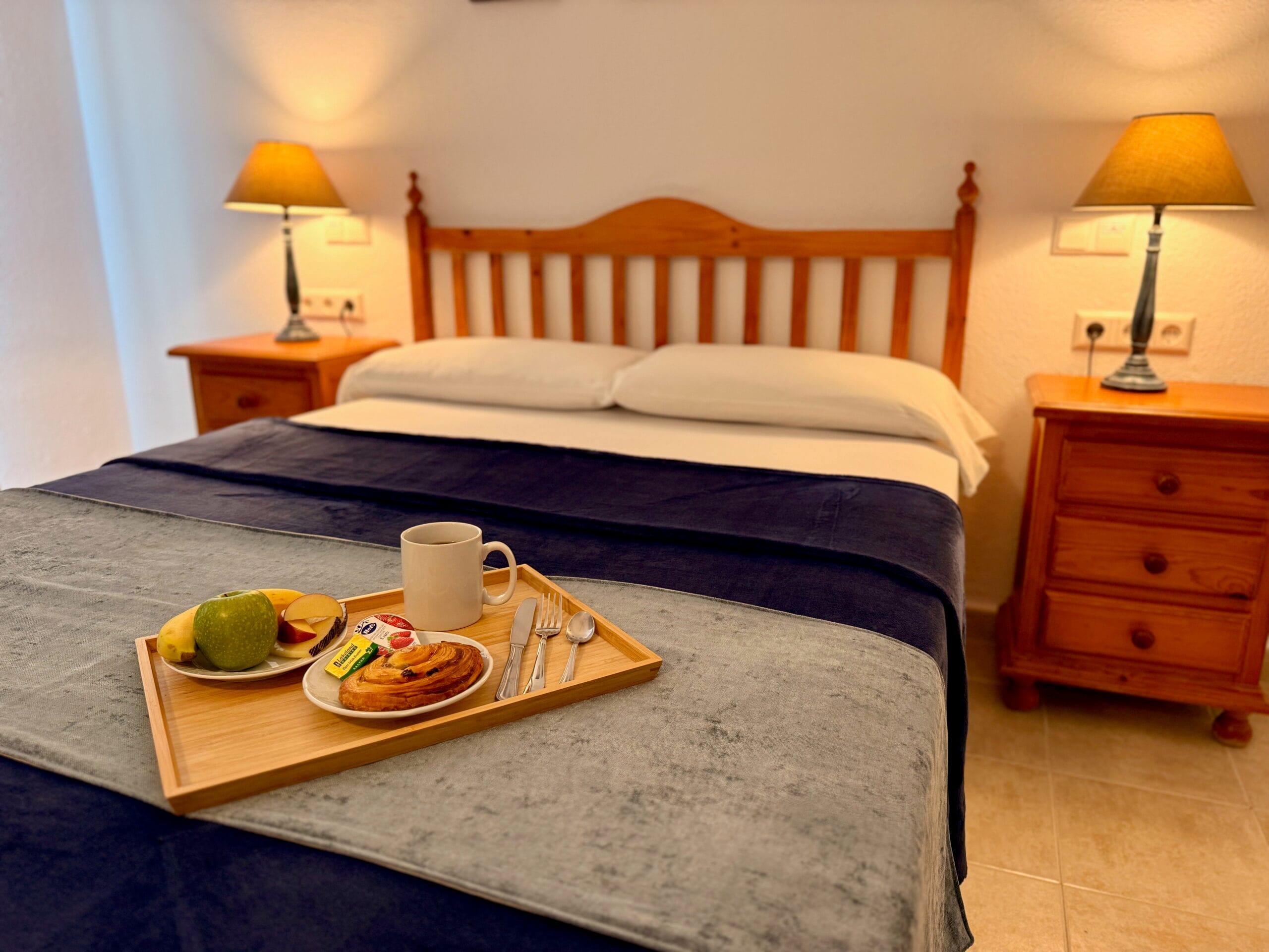 One bedroom apartment bedroom with Breakfast with mood lighting - Benal Beach - Kingfisher Apartments - Holiday Rentals