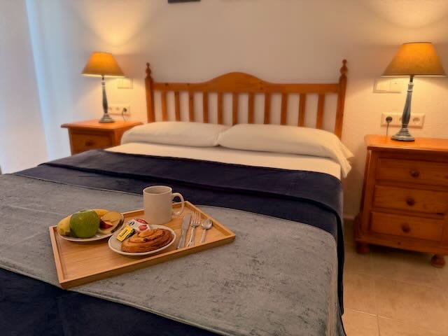 Cosy bedroom at Kingfisher Apartments in Benal Beach, Benalmadena, Spain. Long term rentals